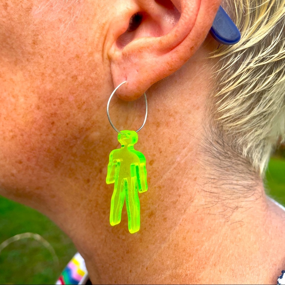 Neo-on colored earring hand designed for human wear!  Street stopper!  Have fun!
